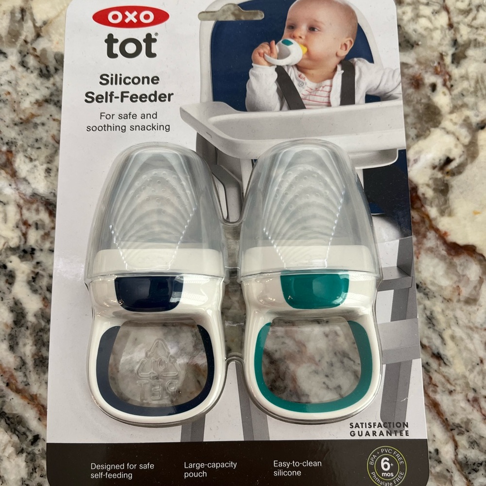 New, in packaging! Oxo Tot Silicone Self-Feeder!